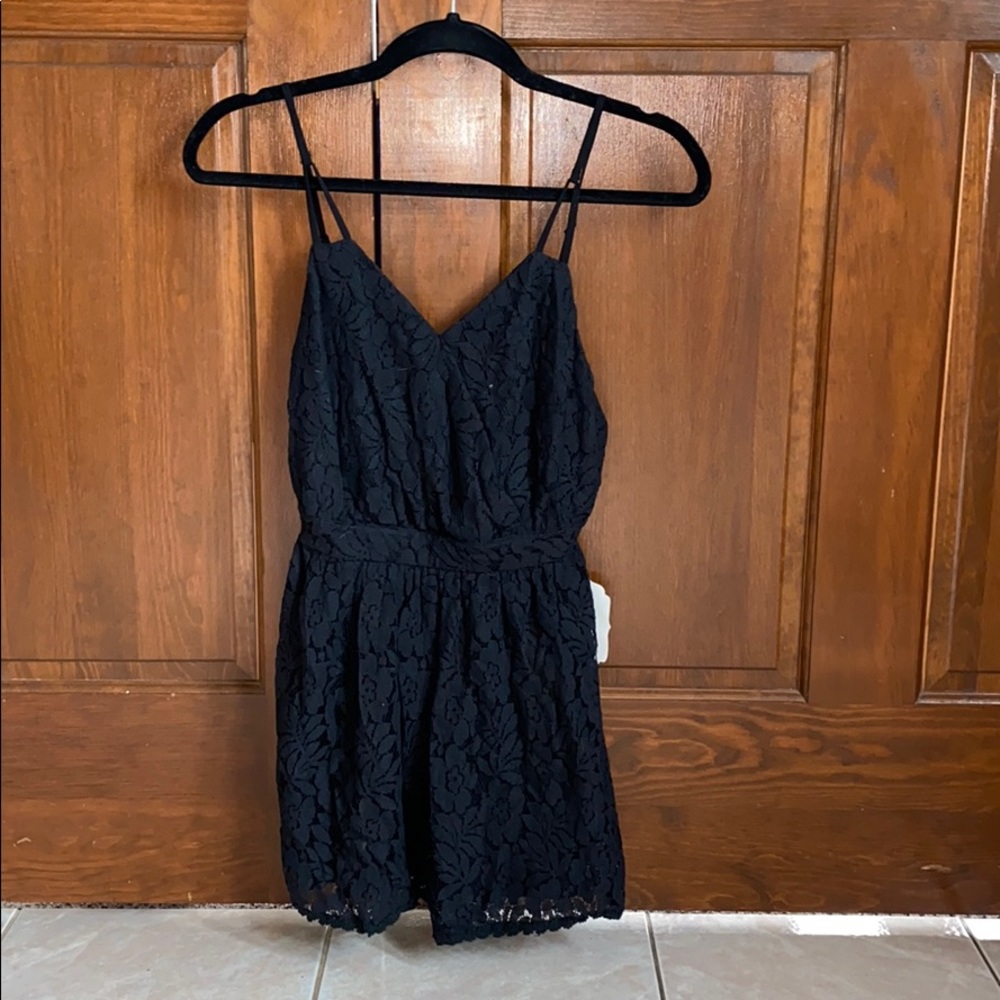 NWT. Altar’d State black lace romper.
